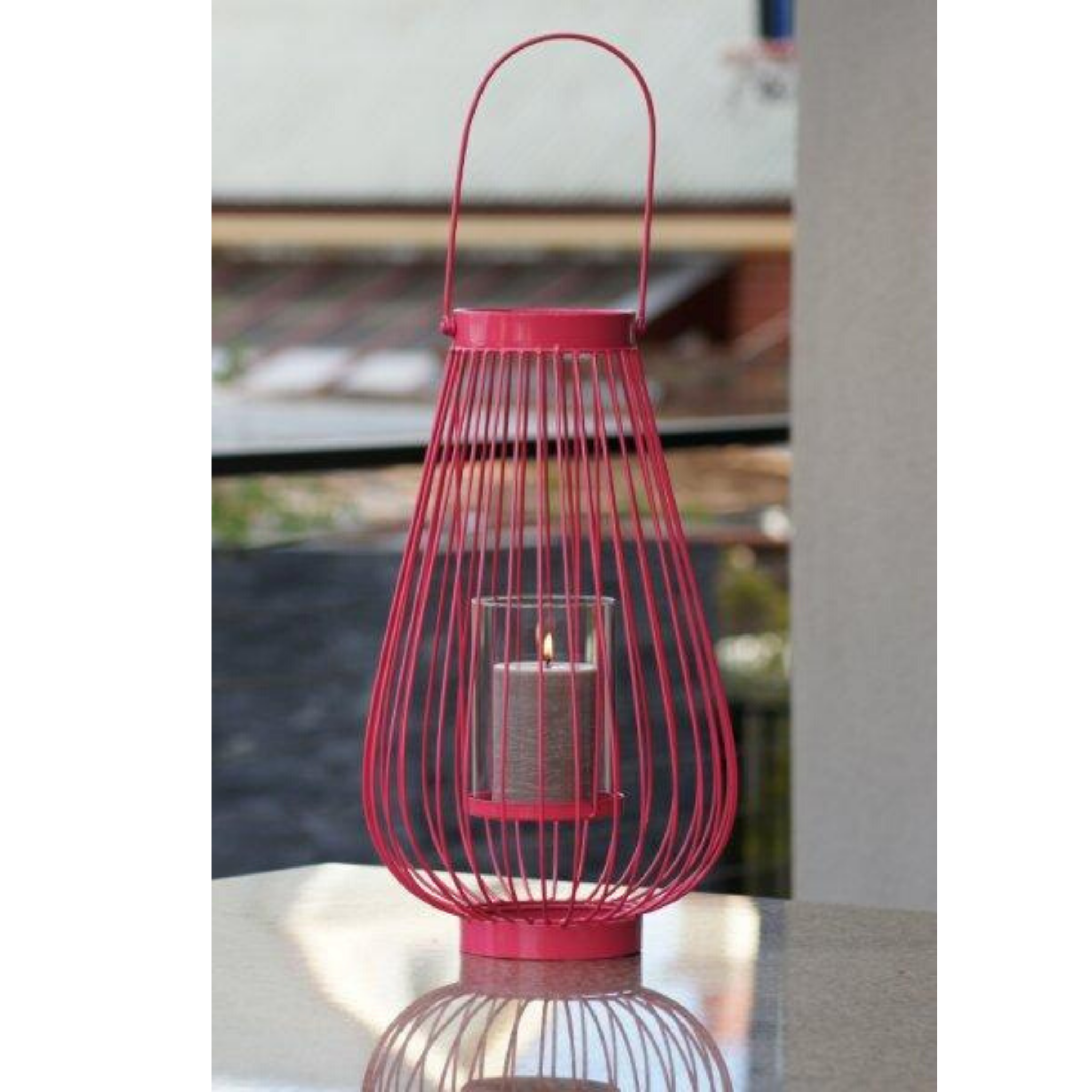 Metal Lantern Candle Holder - Hot Pink  in garden