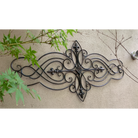 Wall Art, Abstract Metal Decorative - Antique Brown  in the garden on a wall 