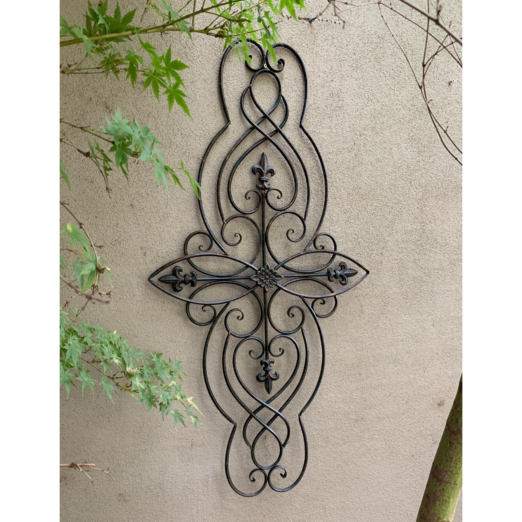 Wall Art, Abstract Metal Decorative - Antique Brown in the garden on a wall vertical