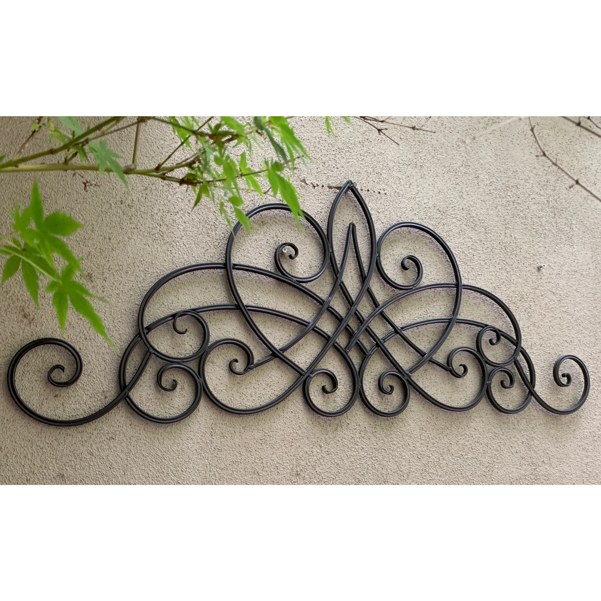 Metal Abstract Wall Decor - Decorative Antique Dark Brown  in garden on a wall