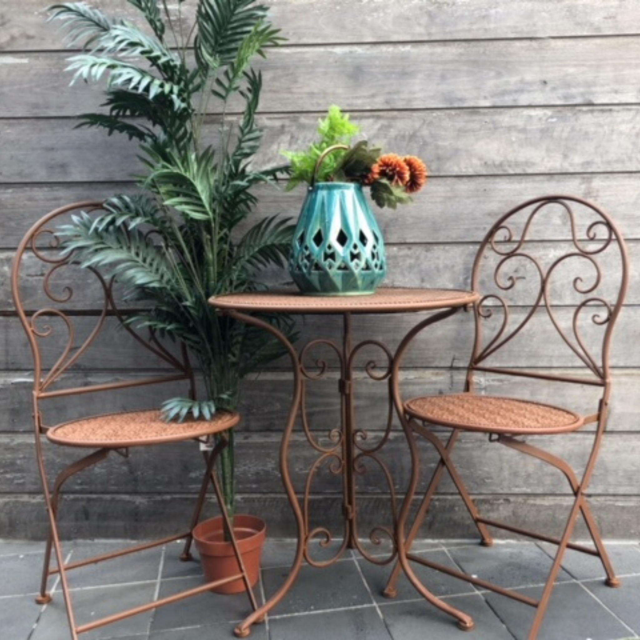 Patio Setting - Mia, Rust 3 Piece Metal Garden Setting on a verandah 