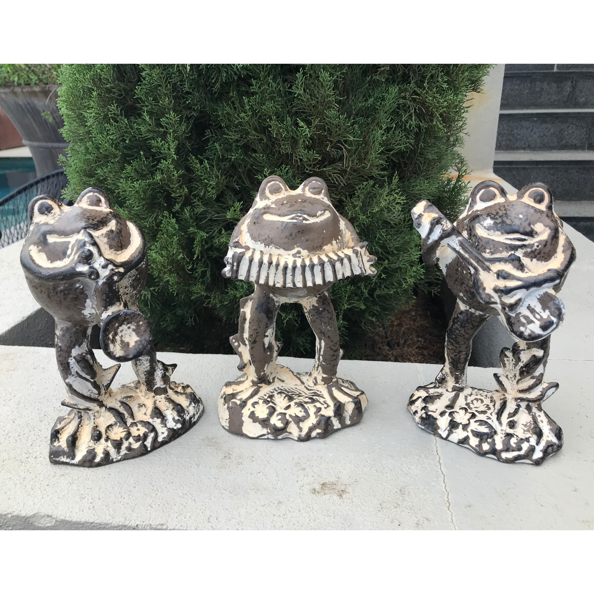 Statue - Frog Playing Trumpet in the garden with 2 other frogs playing the guitar and the accordion