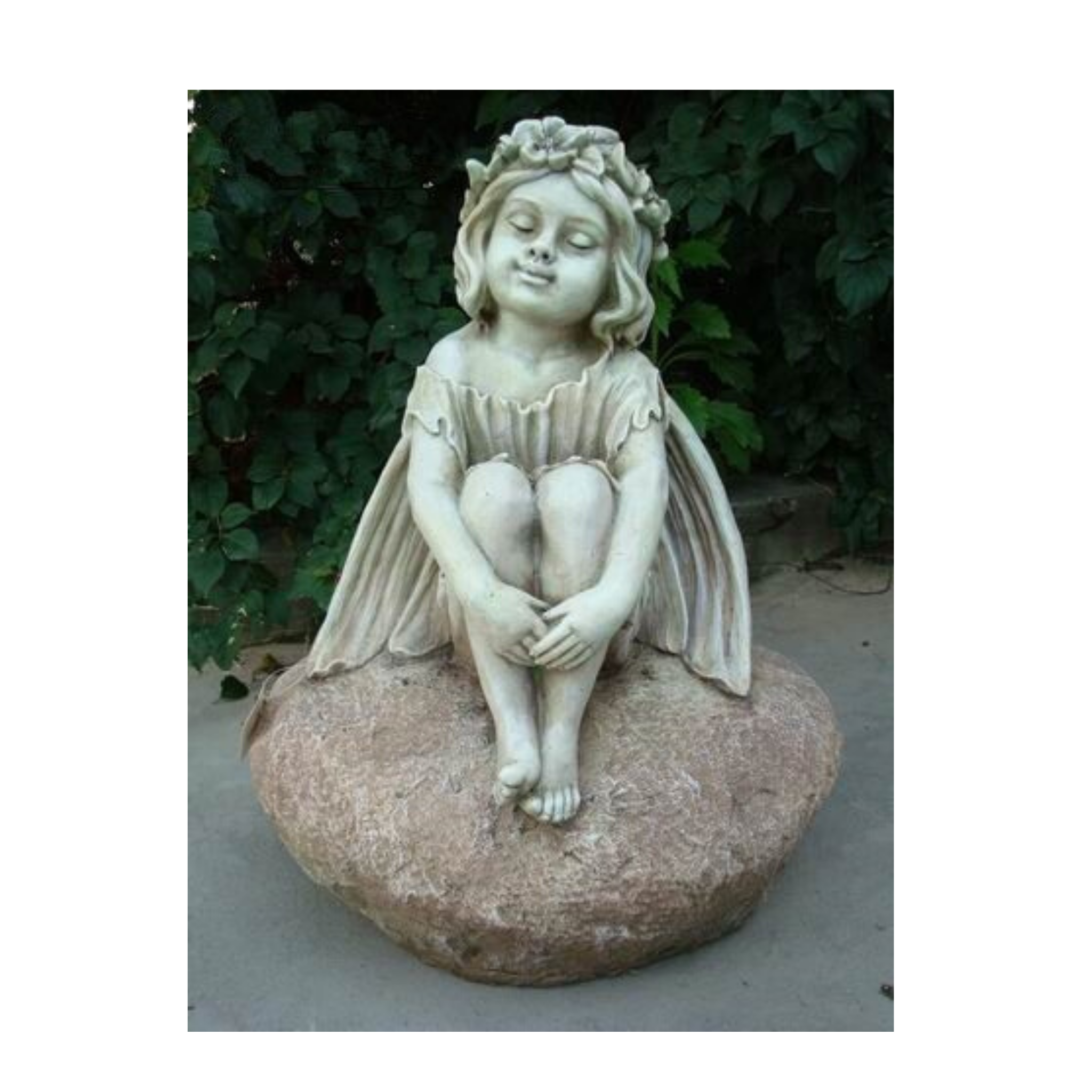 Statue - Fairy Sitting on a Rock in the garden