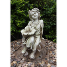 Statue - Fairy on Mushroom Bird Feeder in the garden