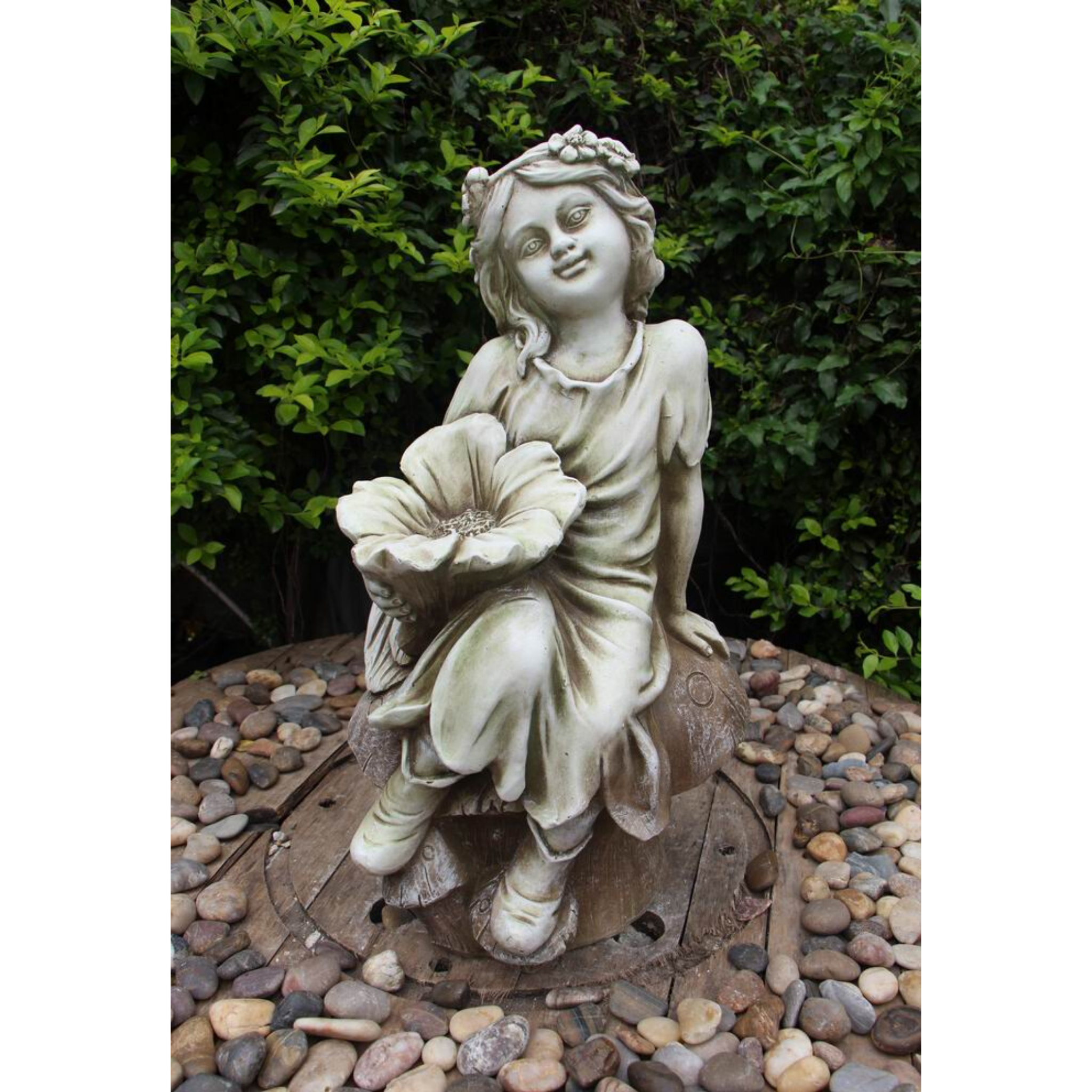 Statue - Fairy on Mushroom Bird Feeder in the garden