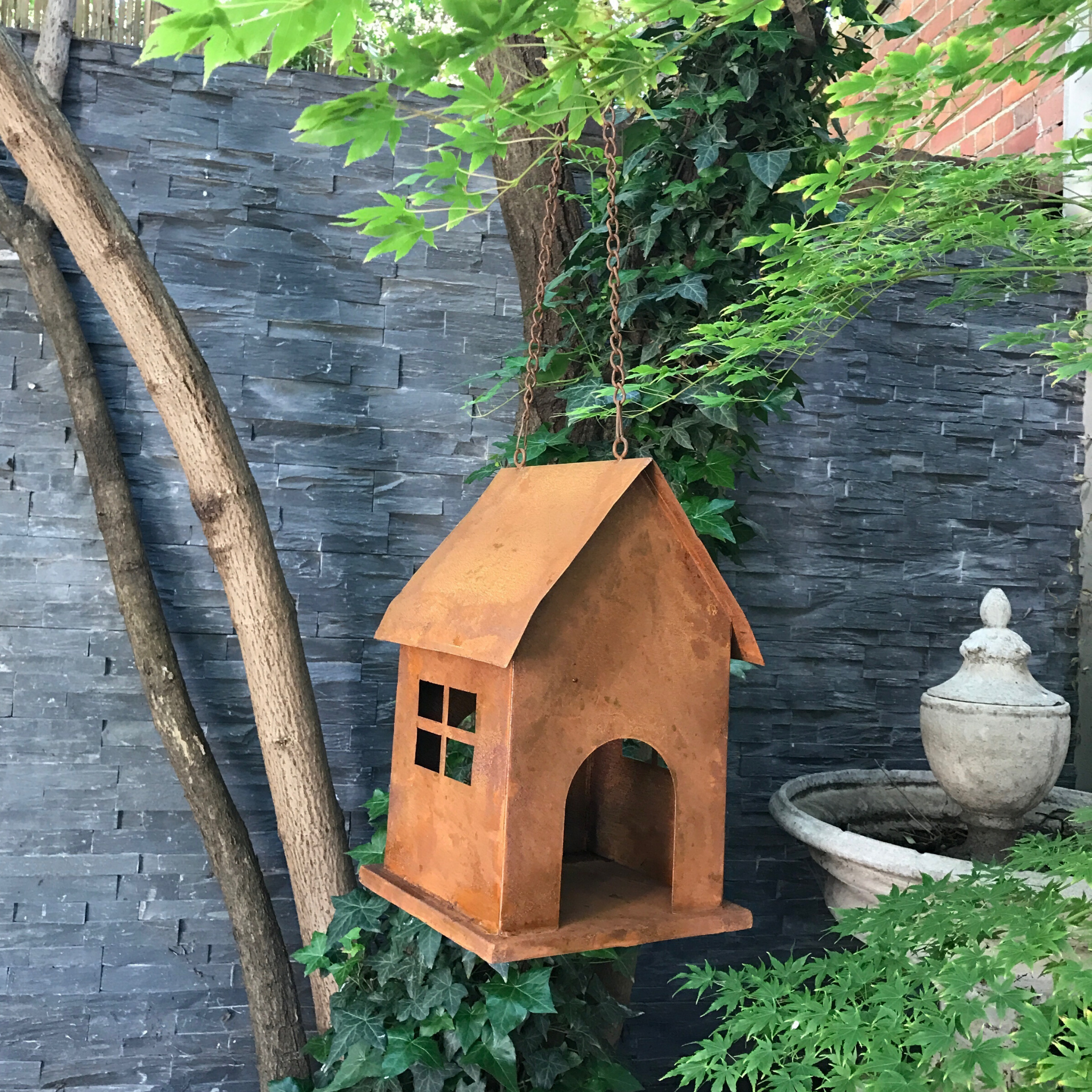 Hanging Birdhouse or birdfeeder in rusty metal 