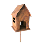 Birdhouse on stake made from rusty metal