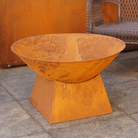 rusty metal fire bowl with plain base